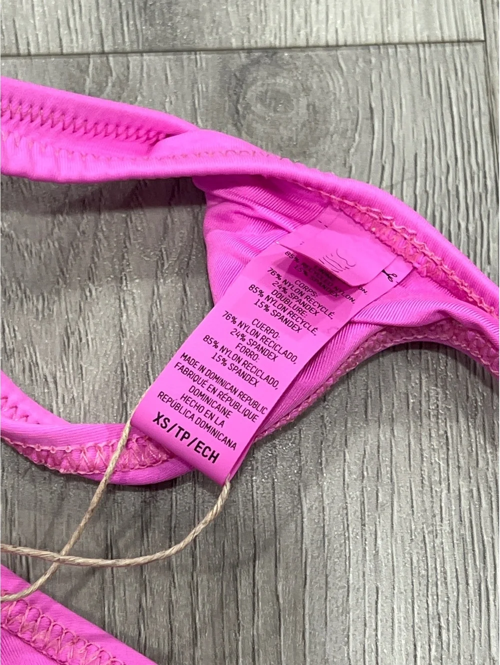 SKIMS SWIM THONG BIKINI BOTTOM IN neon Orchid